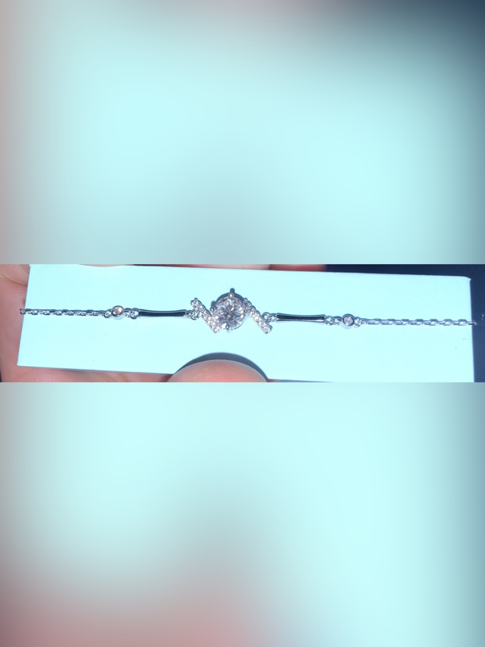 Beautiful Sterling Silver 925 braclet with .75CT Moissanite Pendant.